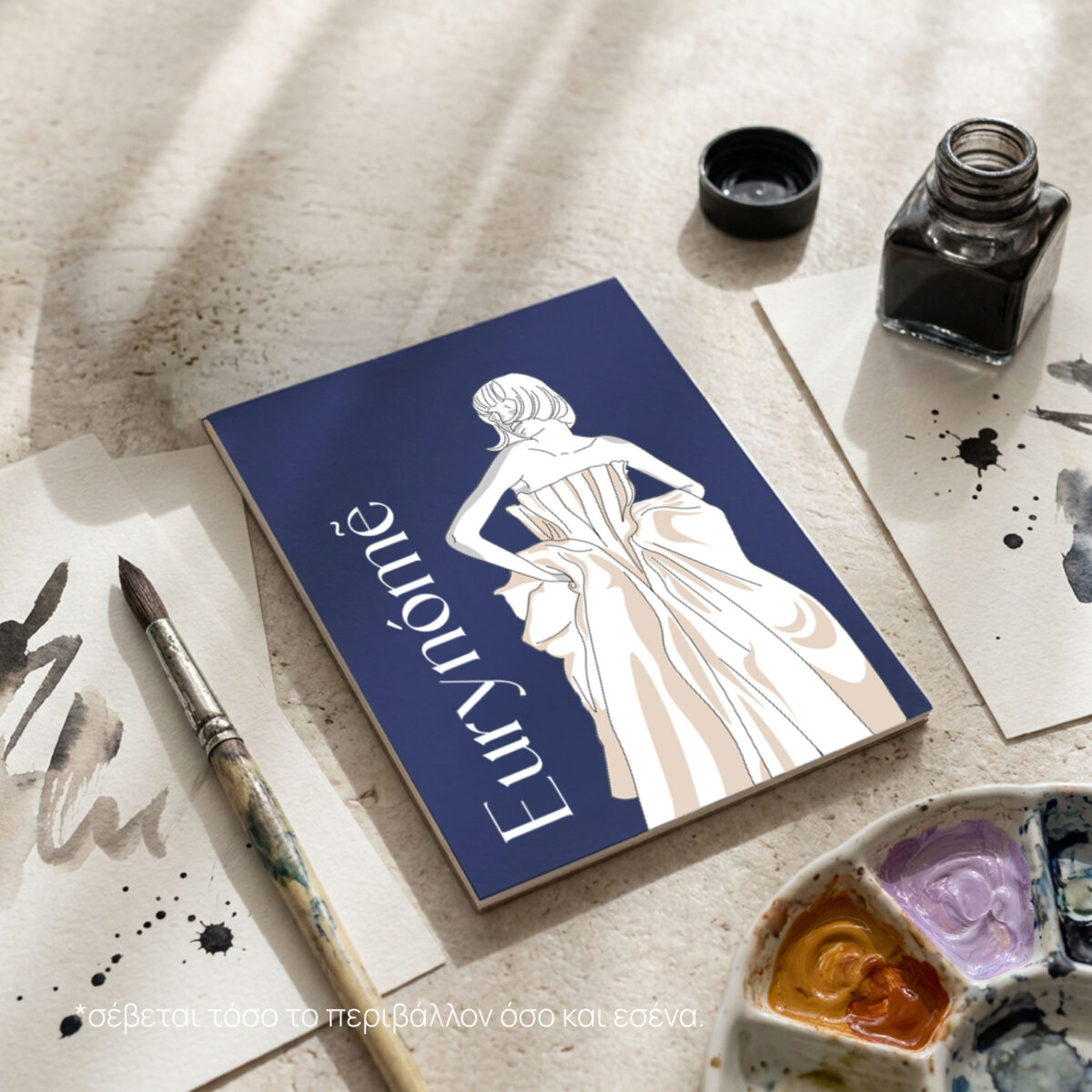 Sketchbook Eurynome lifestyle shot with beach elements and pens